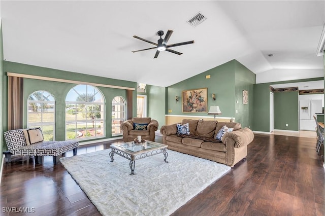 living room with baseboards, visible vents, dark wood finished floors, lofted ceiling, and ceiling fan