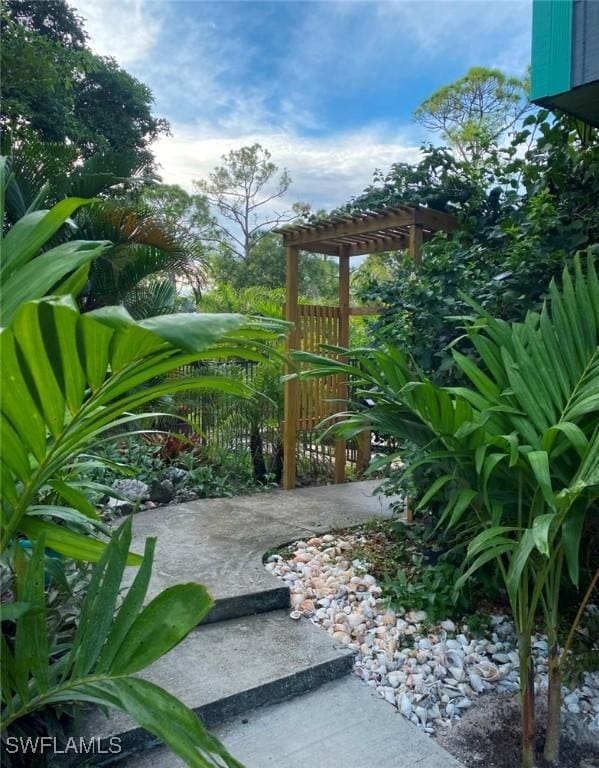 view of yard featuring a pergola and a patio area