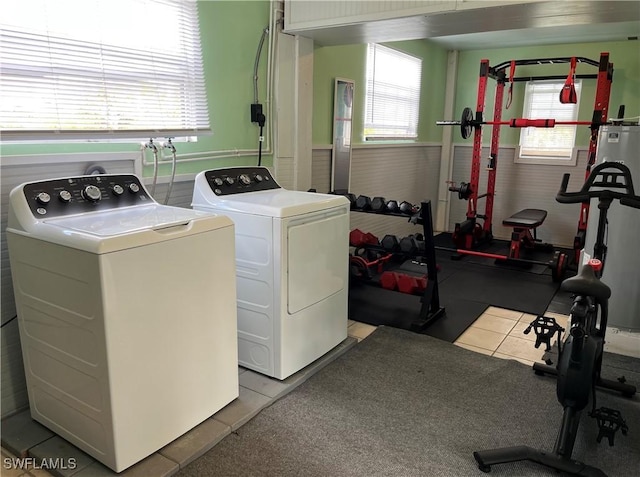 laundry area featuring independent washer and dryer and a wealth of natural light