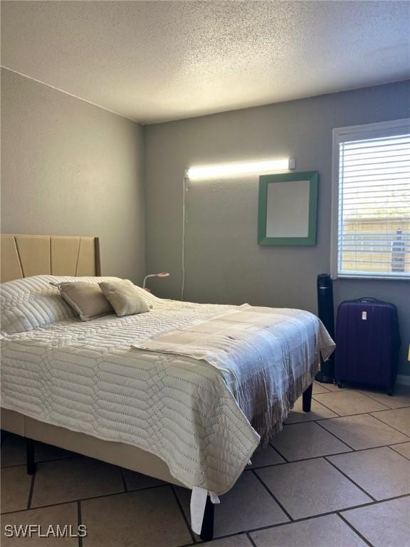 bedroom with a textured ceiling