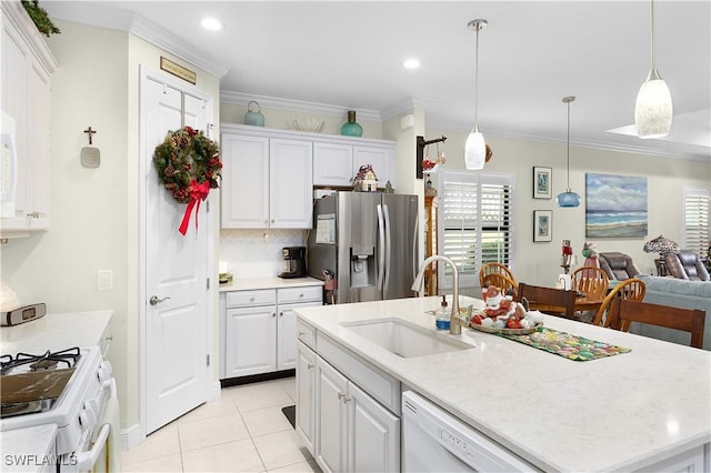 kitchen with white cabinetry, white appliances, and sink