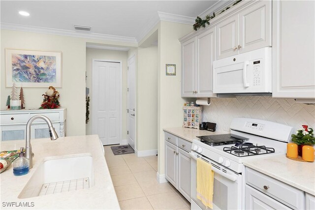 kitchen with white cabinetry, white appliances, sink, and ornamental molding