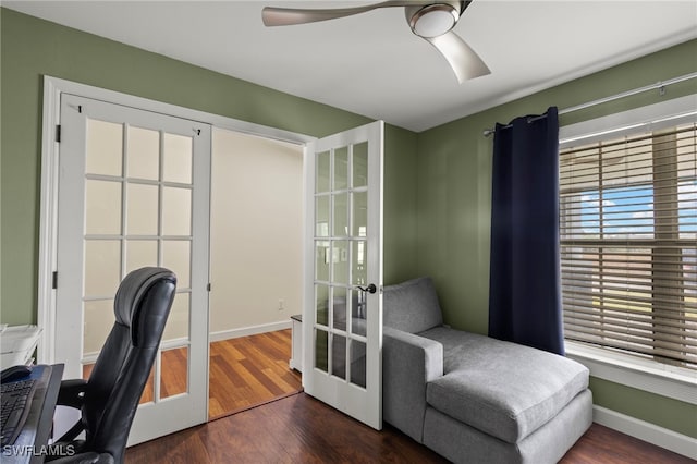 office space featuring a ceiling fan, french doors, baseboards, and dark wood-style flooring