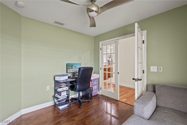 home office featuring french doors, baseboards, ceiling fan, and dark wood-style flooring