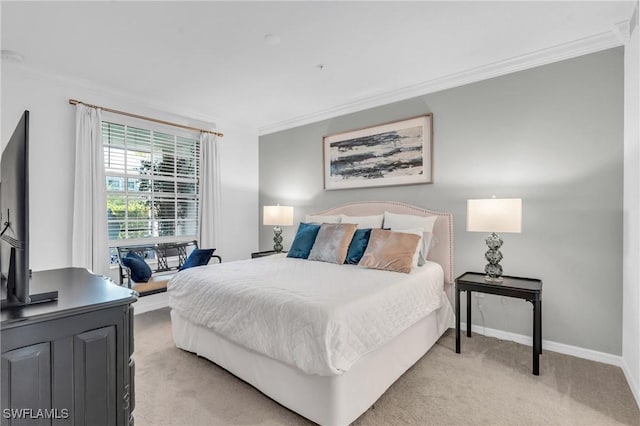 bedroom with light carpet and crown molding