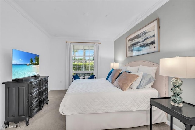 carpeted bedroom featuring crown molding