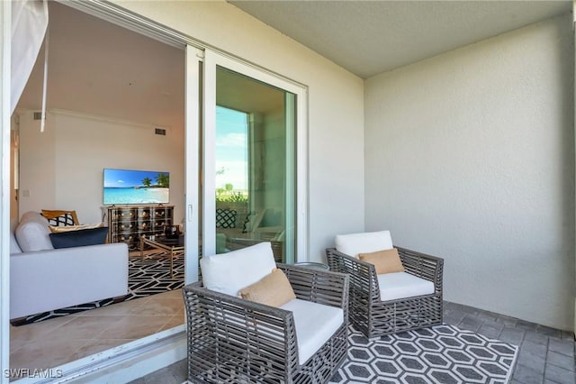 balcony featuring a patio area