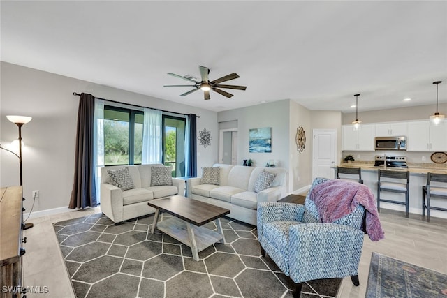 living room with ceiling fan