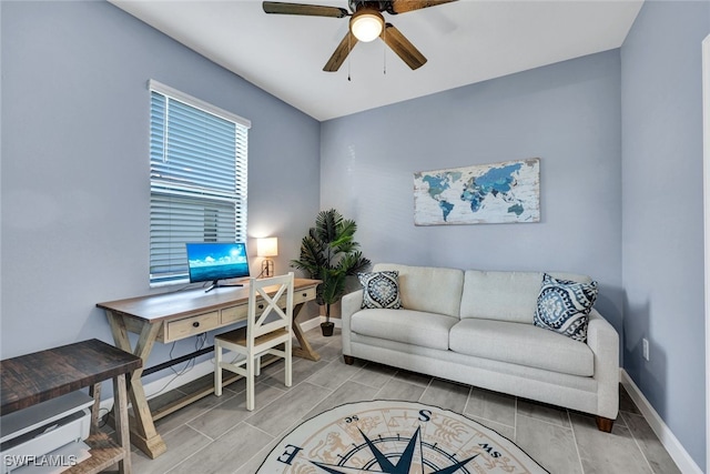 home office featuring ceiling fan and light hardwood / wood-style floors