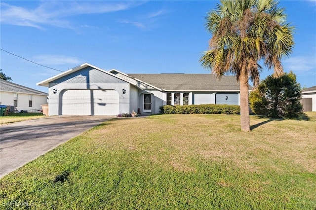 ranch-style home with a front lawn and a garage