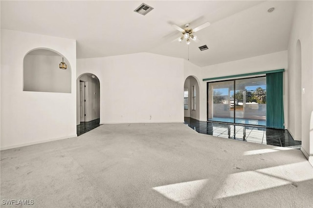 interior space with ceiling fan and lofted ceiling