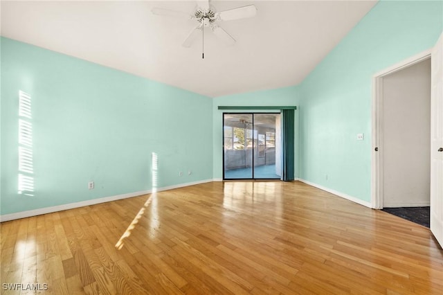 unfurnished room with ceiling fan, light hardwood / wood-style floors, and vaulted ceiling