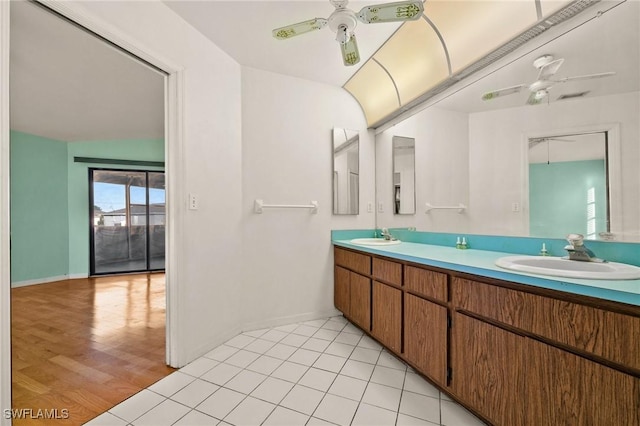 bathroom with ceiling fan, hardwood / wood-style floors, and vanity