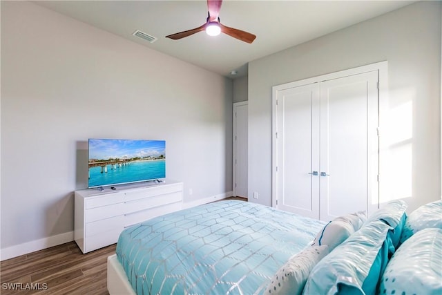 bedroom with wood-type flooring and ceiling fan