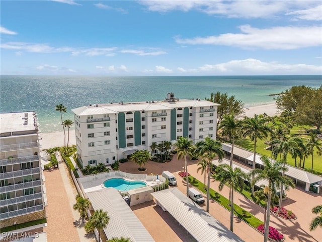 bird's eye view featuring a beach view and a water view