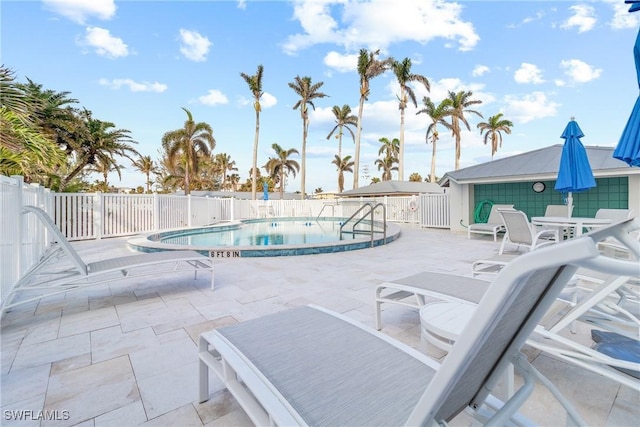 view of pool featuring a patio