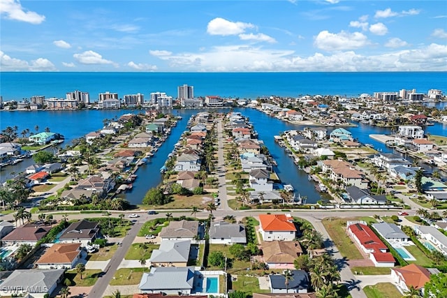 9940 Vanderbilt Dr, Naples, FL 34108 - drone / aerial view featuring a water view and a residential view