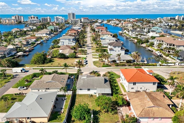 9940 Vanderbilt Dr, Naples, FL 34108 - birds eye view of property featuring a water view and a residential view
