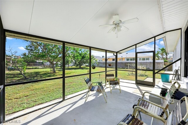 9940 Vanderbilt Dr, Naples, FL 34108 - sunroom with a ceiling fan