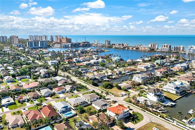 9940 Vanderbilt Dr, Naples, FL 34108 - birds eye view of property featuring a water view, a city view, and a residential view