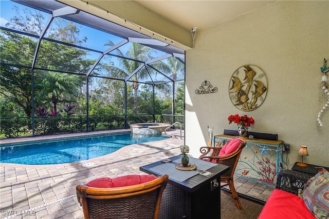 view of swimming pool with an in ground hot tub, a patio, and glass enclosure