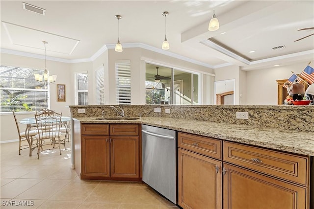 kitchen with dishwasher, decorative light fixtures, light stone counters, and sink