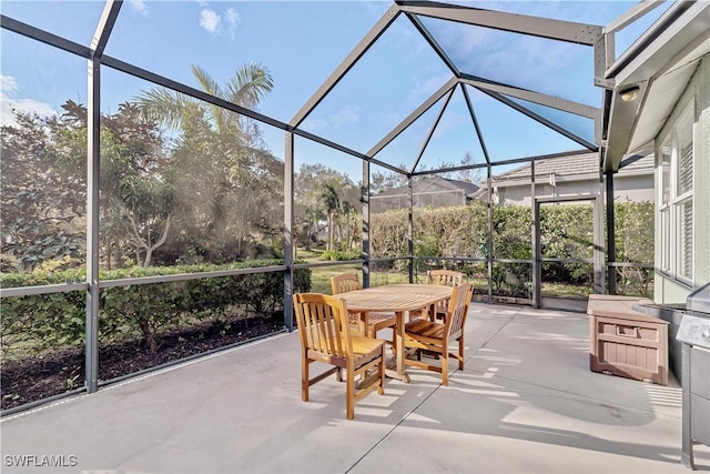 view of patio with a lanai