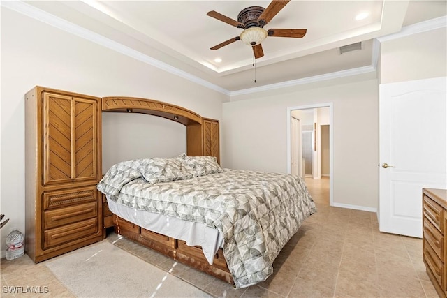 tiled bedroom featuring a tray ceiling, ceiling fan, and crown molding