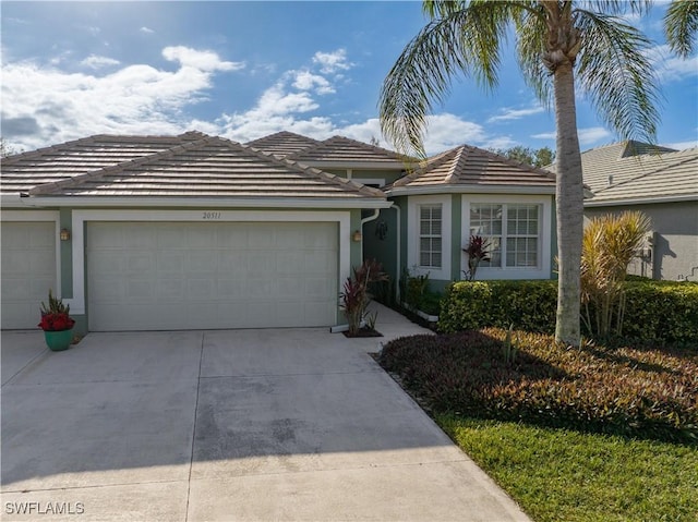 single story home featuring a garage