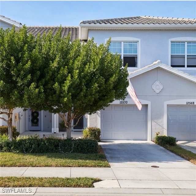 view of front of property with a garage