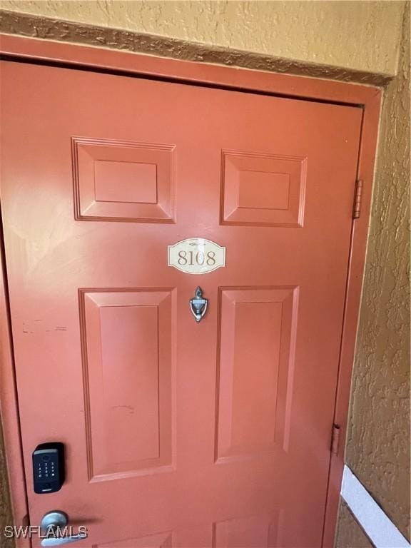 1885 Florida Club Dr Unit 8108, Naples, FL 34112 - detailed view of stucco siding