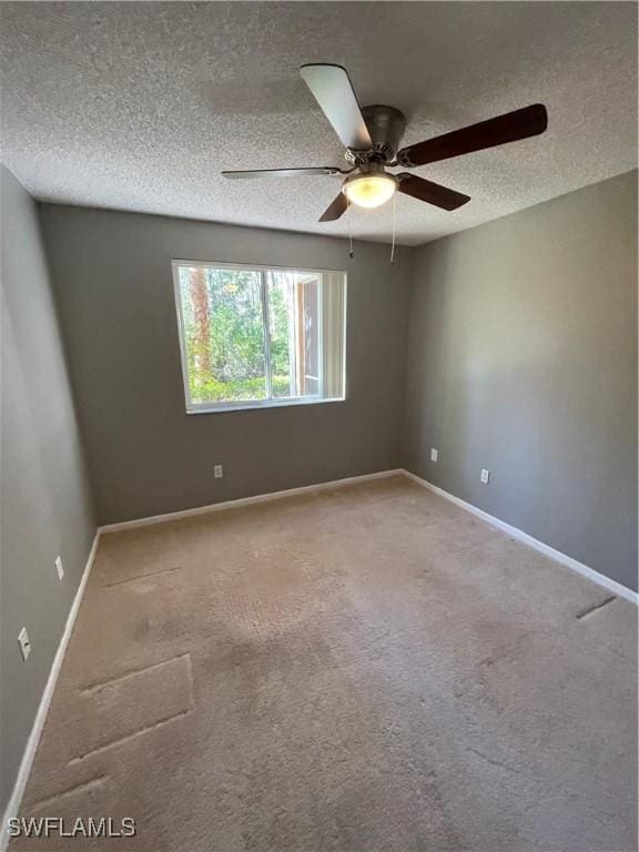 1885 Florida Club Dr Unit 8108, Naples, FL 34112 - carpeted empty room with a textured ceiling and ceiling fan