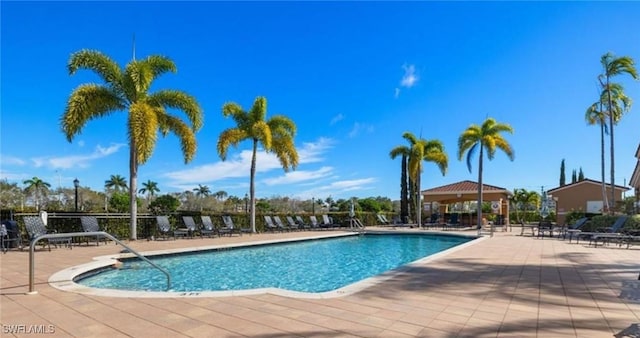 view of swimming pool featuring a patio area