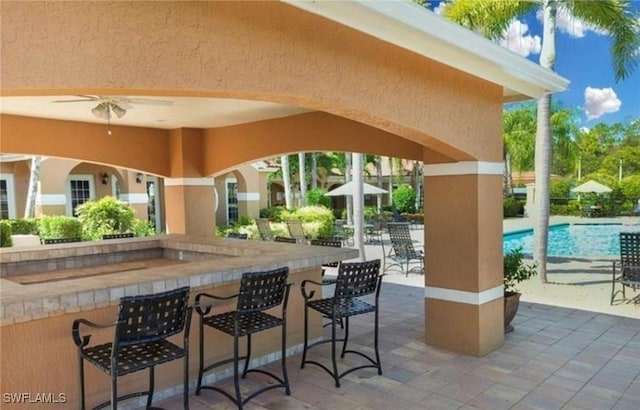 1885 Florida Club Dr Unit 8108, Naples, FL 34112 - view of patio / terrace featuring a community pool