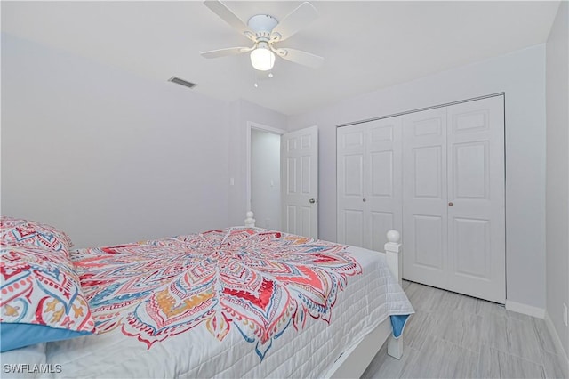 bedroom featuring a closet and ceiling fan