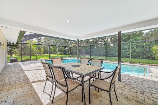 unfurnished sunroom featuring a pool