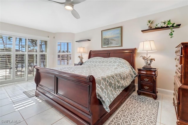 tiled bedroom with access to exterior and ceiling fan