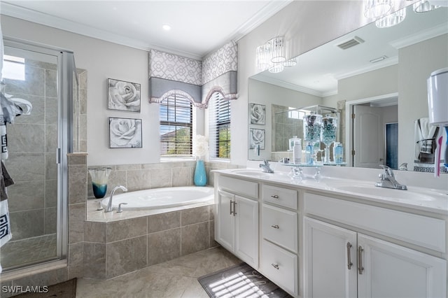 bathroom with tile patterned floors, vanity, crown molding, and shower with separate bathtub