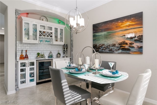 dining room with ornamental molding, wine cooler, and indoor bar