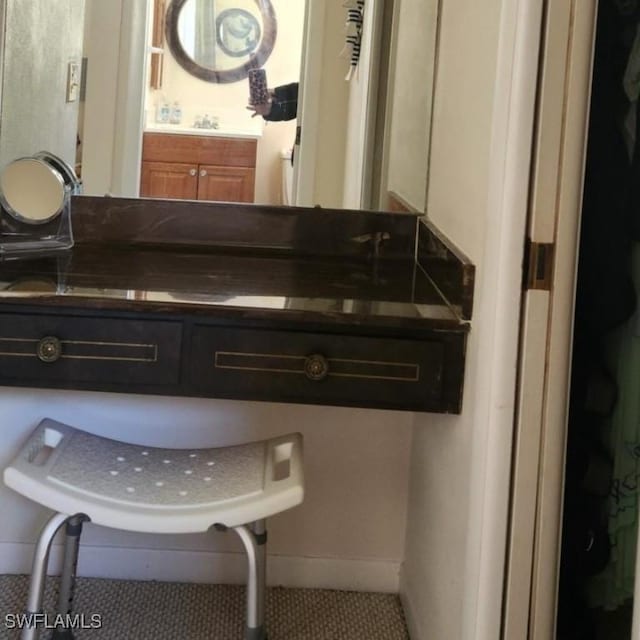 bathroom featuring tile patterned floors and sink