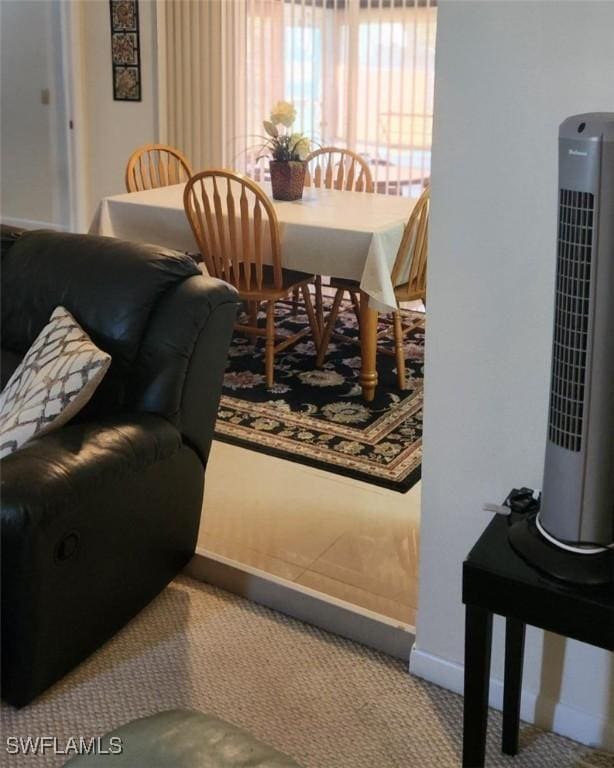 dining space with carpet floors