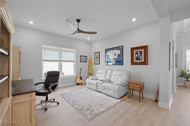 office space with light hardwood / wood-style flooring and ceiling fan