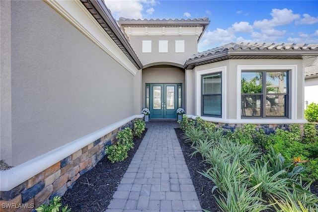 doorway to property featuring french doors