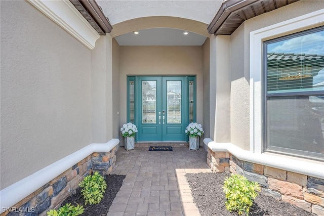 doorway to property with french doors