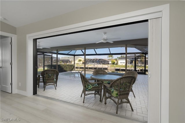 dining space featuring hardwood / wood-style floors, ceiling fan, and a wealth of natural light