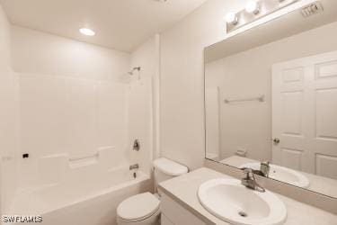 full bathroom with vanity, toilet, and tub / shower combination