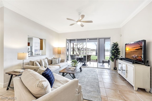 living room featuring ceiling fan, ornamental molding, and light tile patterned floors