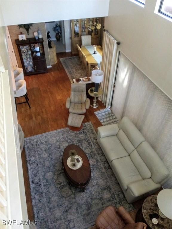 living room featuring dark wood-type flooring