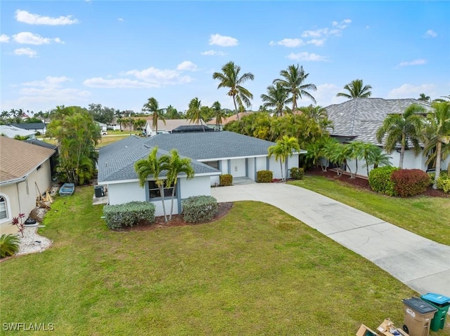 single story home with a front lawn