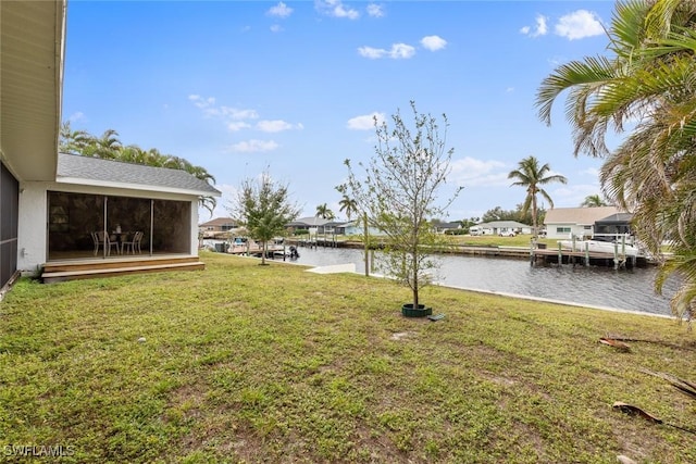 view of yard with a water view